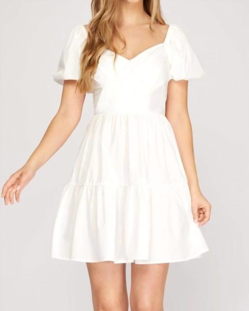 Front of a model wearing a size L V Neck Dress In White in White by SHE + SKY. | dia_product_style_image_id:342319